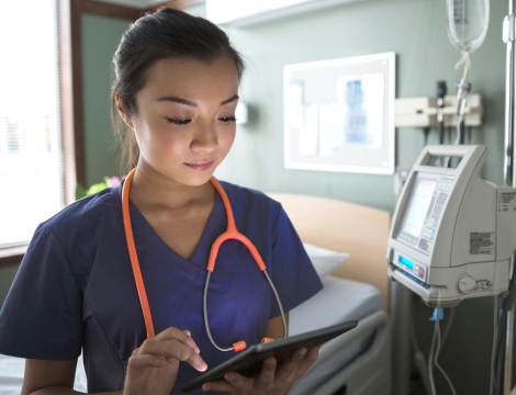 A nurse using a tablet