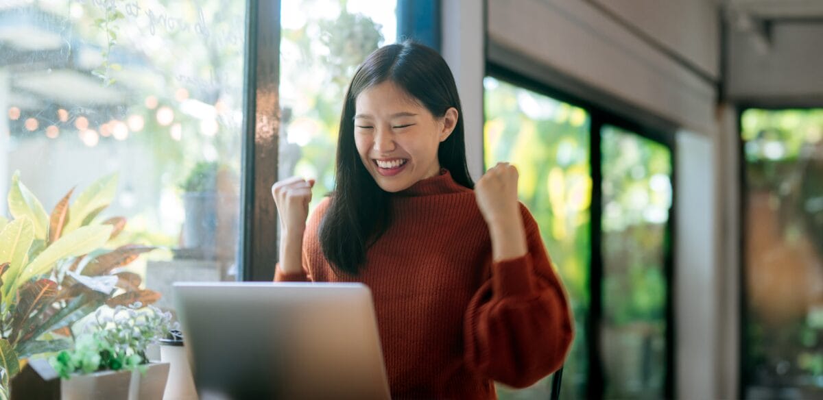 happy girl looking the computer