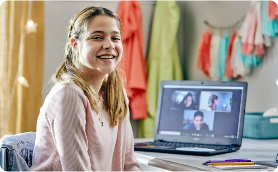 Student attending an online class at home