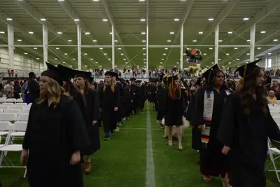 Graduates walking in their ceremony
