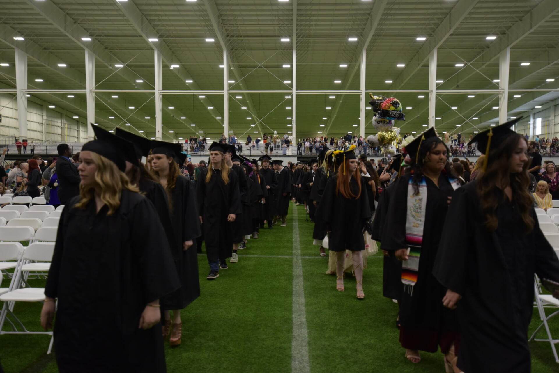 Graduates walking in their ceremony