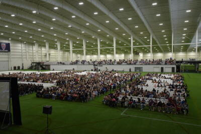 People arriving at a ceremony event