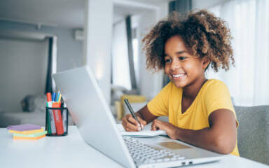 Child learning online.