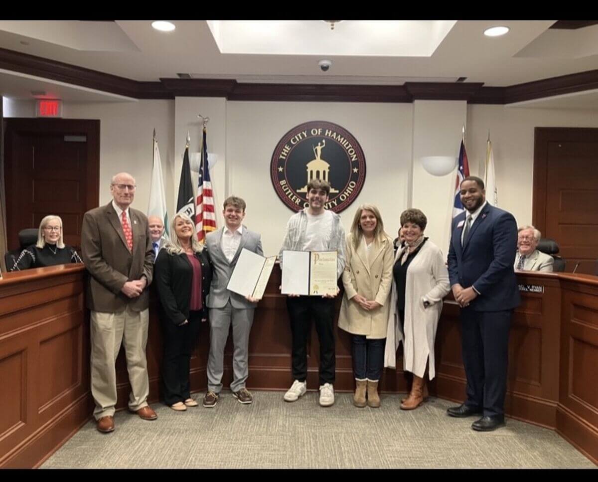 Pictured left to right is the Mayour of Hamilton, Brayden Osborne's mother, Brayden, Reed Stewart, his mother, his grandmother and school administrator Sammy Broyels.