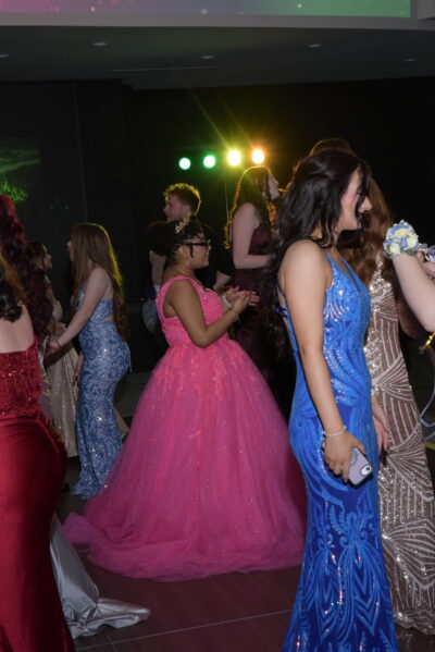 girls in formal dresses at the prom