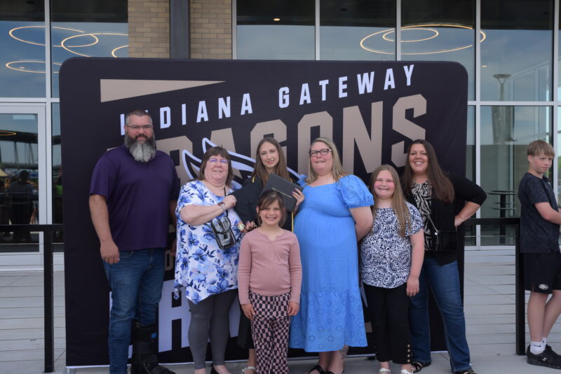 family with girl at the graduation