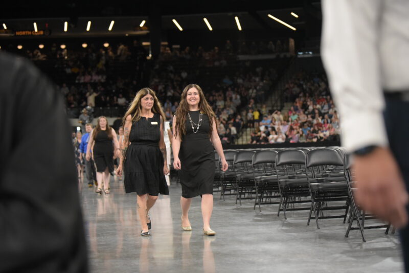 students walking for diplomas