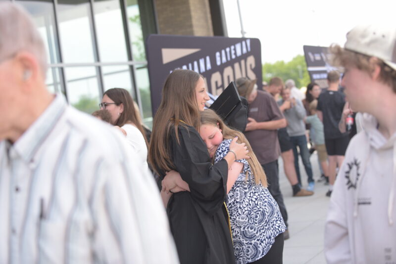 girls hugging each other