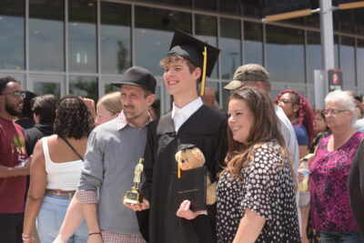 graduated boy with family
